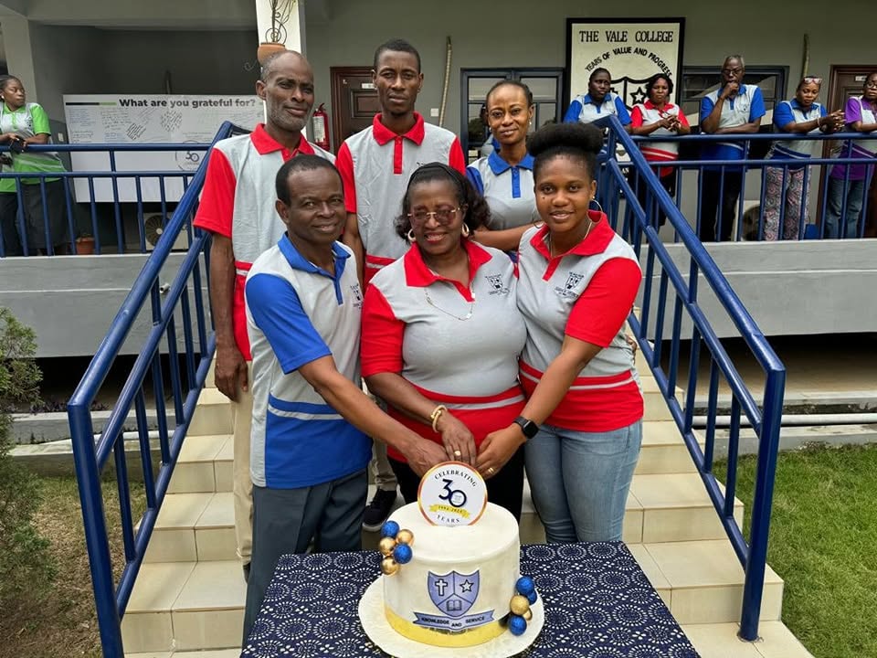 Staff members celebrating The Vale College’s thirtieth anniversary
